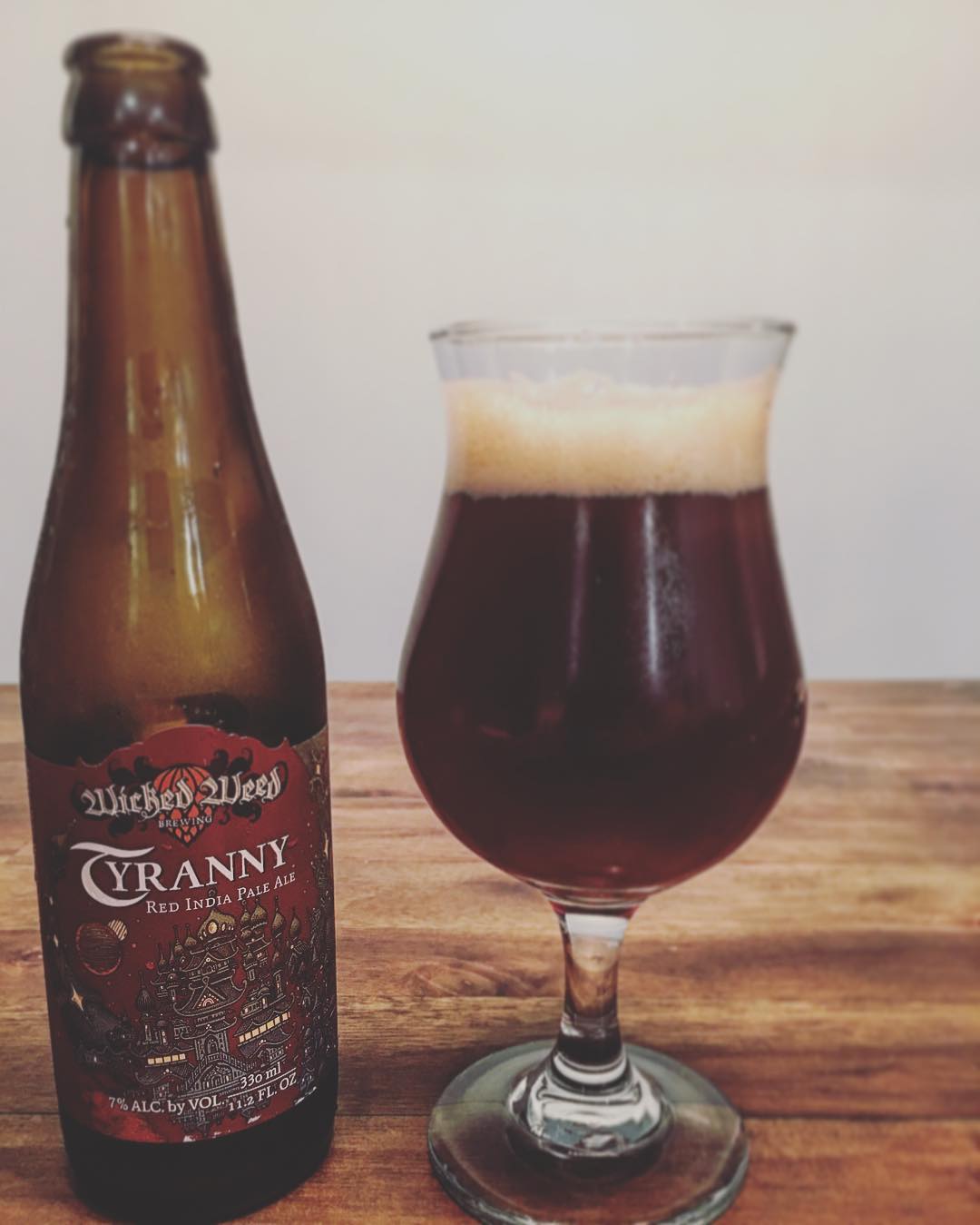 Day 7, the final day or #americancraftbeerweek2016. We've got an offering from @wickedweedbrewing. Tyranny is a red IPA, and it delivers on that. Nice and malty but with some spicy hops and fruitiness not too common to the regular red ale. A nice bridge between the styles for sure. Sneak peek of what's to come, as I'm pretty sure they'll be in the Savannah market before we know it! #wickedweed #bowtiebarbecueco #beer #craftbeer #avlbeer #tryannyredipa #redale #ipa #hops