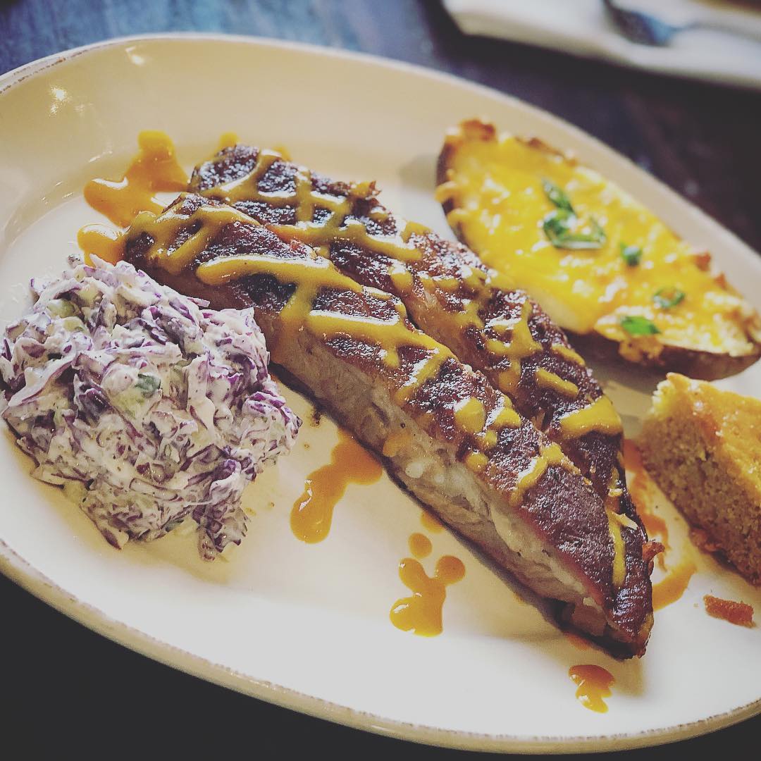 Smoked Spareribs with red cabbage slaw and twice baked potato!…